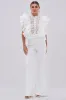 WALK THAT WALK RUFFLE JUMPSUIT IN WHITE sold by AKIRA