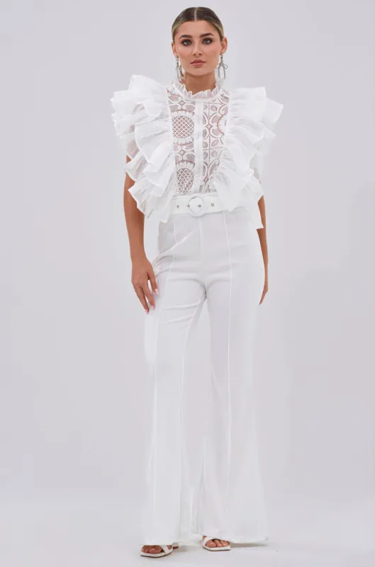 WALK THAT WALK RUFFLE JUMPSUIT IN WHITE sold by AKIRA