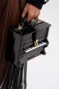 PLAY ME PIANO PURSE sold by AKIRA