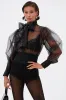 DANCE AND SHAKE BLOUSE WITH BOW IN BLACK sold by AKIRA
