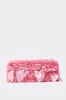 WITH A BOW CLUTCH sold by AKIRA