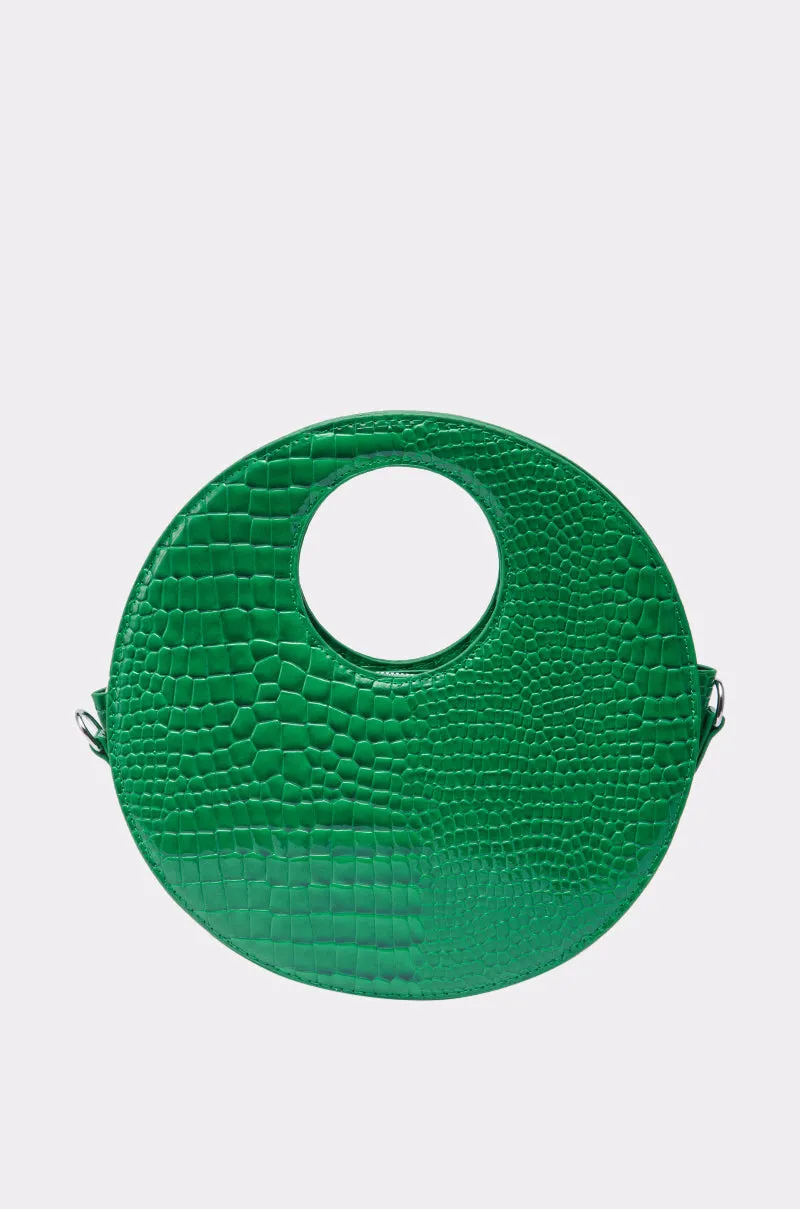 THE CIRCLE PURSE sold by AKIRA