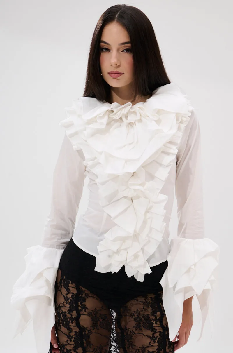 OVER THE TOP RUFFLE BLOUSE sold by AKIRA