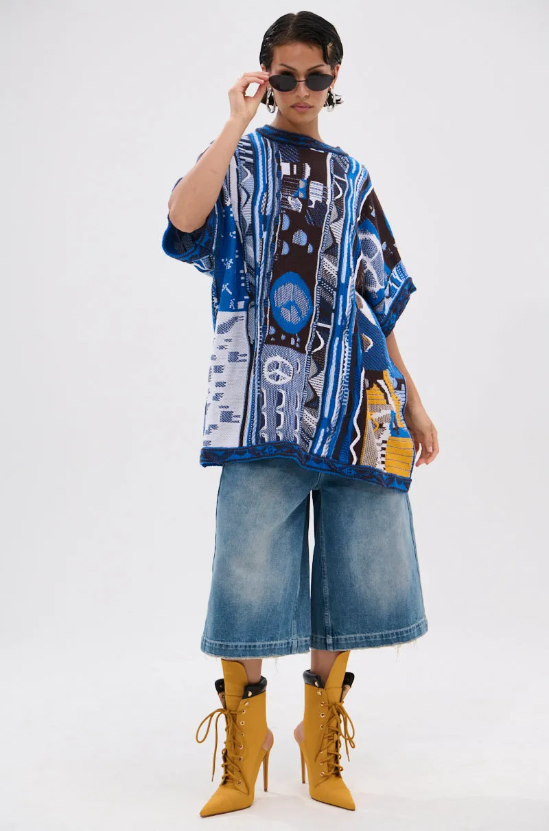 PEACE AND LOVE SWEATER sold by AKIRA