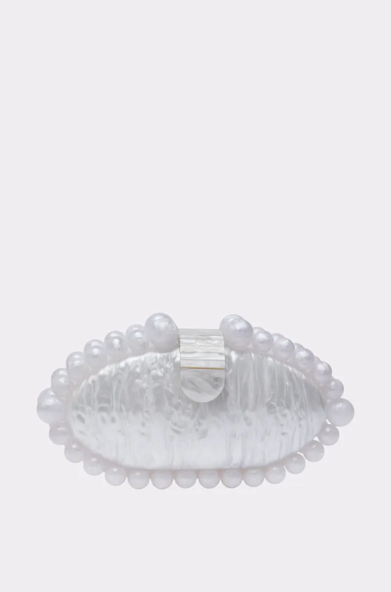 EXPENSIVE TASTE CLUTCH sold by AKIRA