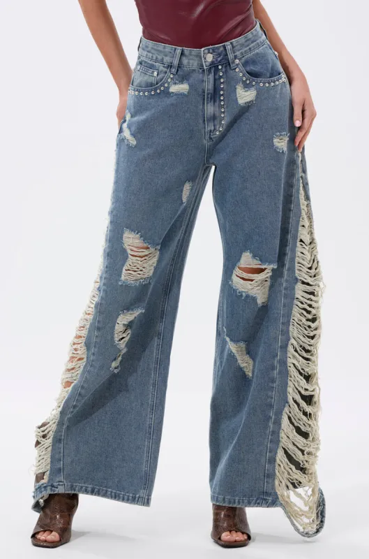 OVER IT DISTRESSED RELAXED DENIM sold by AKIRA