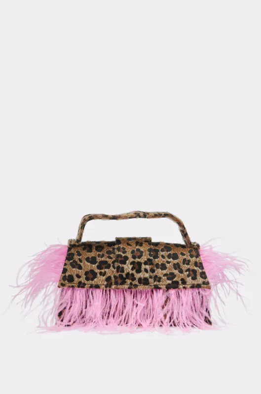 TOO WILD FEATHER PURSE sold by AKIRA