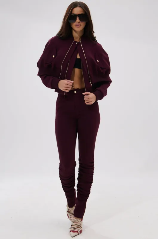 LYNX STACKED TROUSER IN BURGUNDY sold by AKIRA