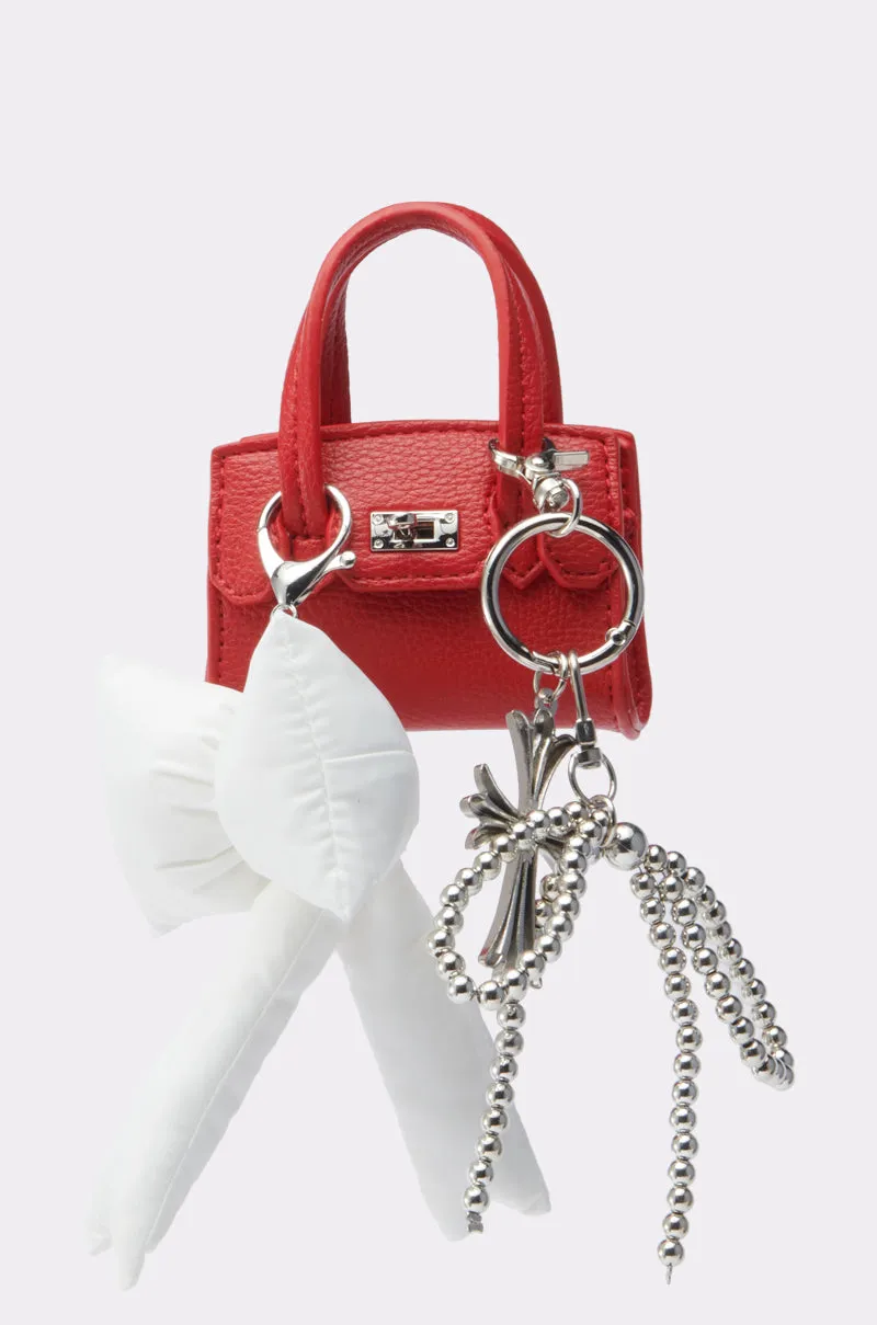 SO CUTE SO MINI PURSE sold by AKIRA