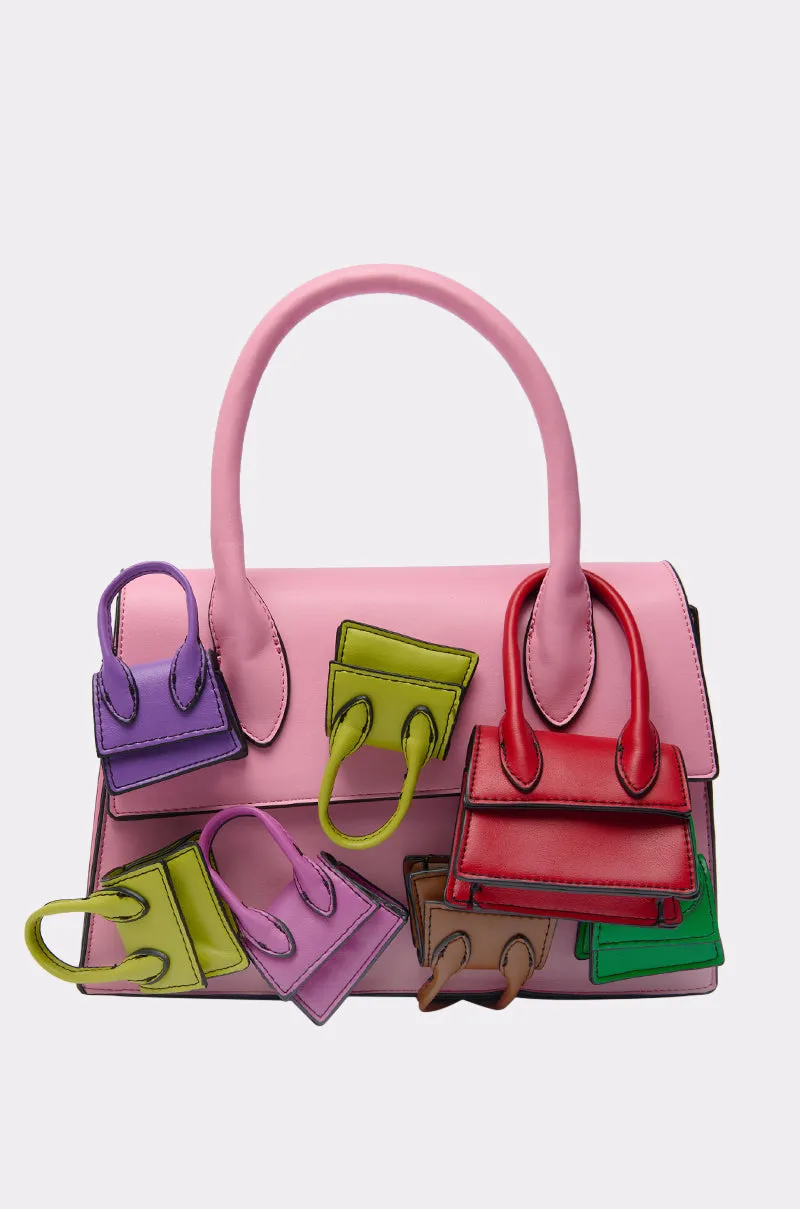 IN MY BAGS PURSE sold by AKIRA