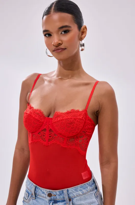 BURNING PASSION LACE BODYSUIT IN RED sold by AKIRA
