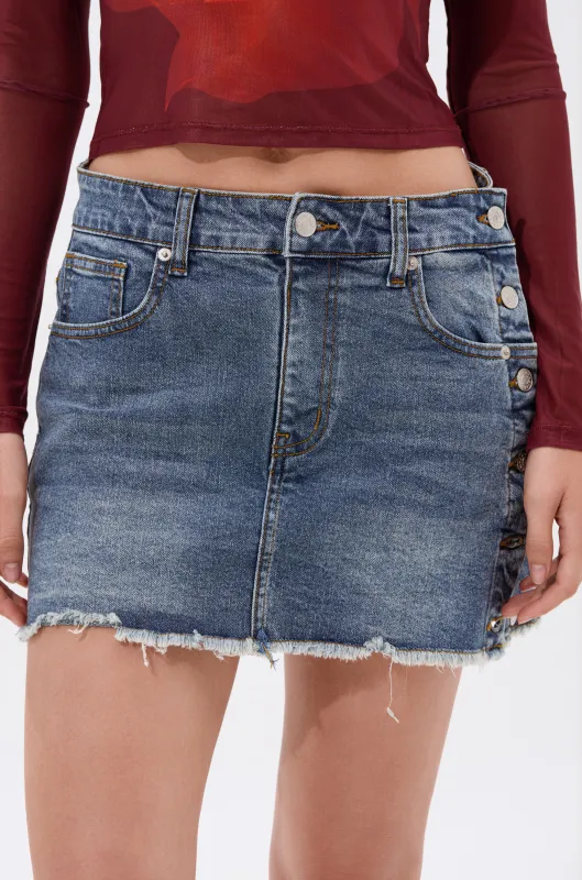 SNAP IT DENIM MINI SKIRT sold by AKIRA