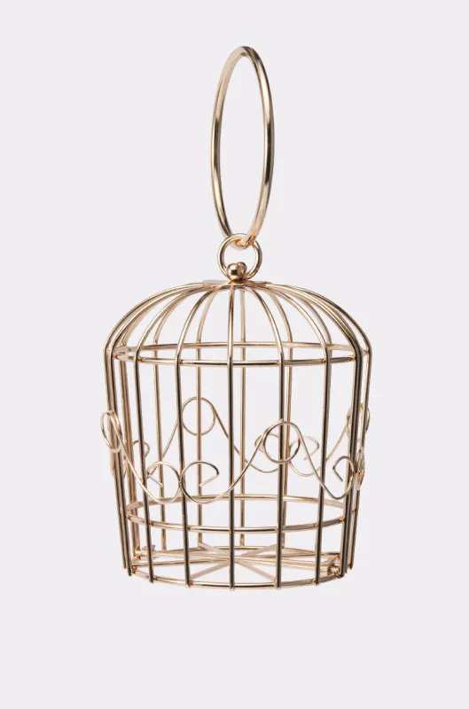 NEVER CAGED PURSE sold by AKIRA