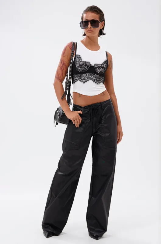 DONT GIVE UP COATED WIDE LEG DENIM WITH GROMMET sold by AKIRA