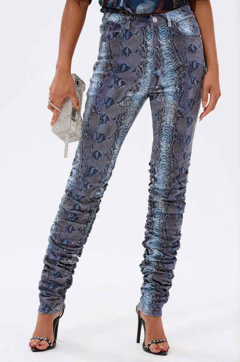DAYS END RUCHED STACKED SNAKE SKINNY DENIM sold by AKIRA