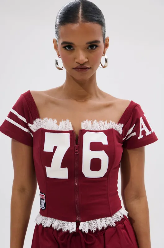 PLAY TIME IS OVER FRONT ZIP CORSET TOP made by AKIRA