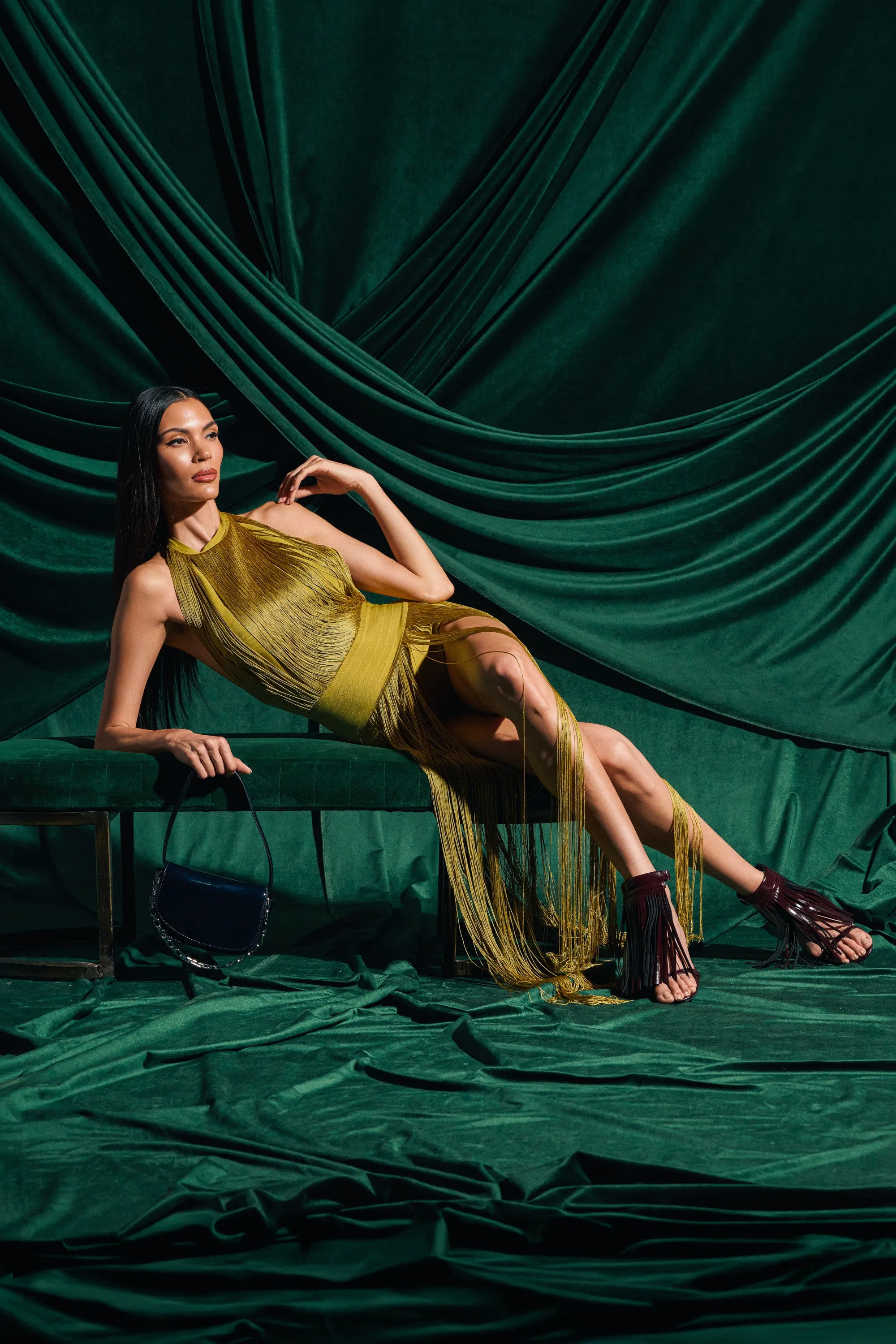 RENEE FRINGE ROMPER IN GREEN sold by AKIRA