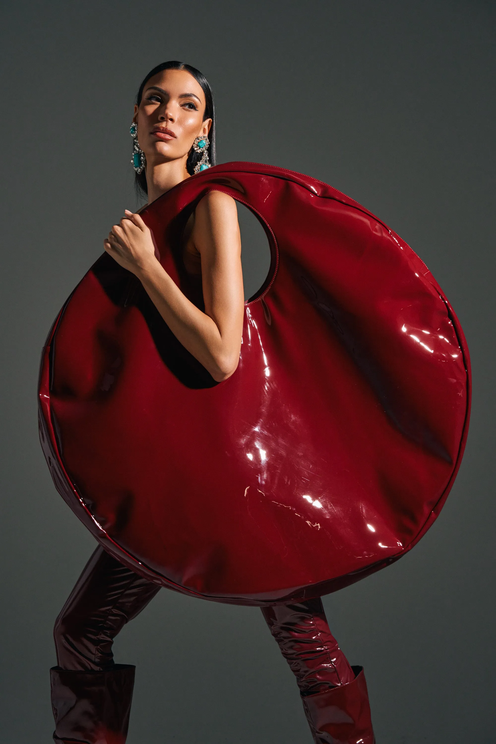 EPITOME OF LUXURY PATENT OVERSIZED TOTE sold by AKIRA