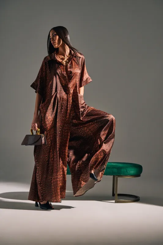 SHE'S RICH OVERSIZED SATIN JUMPSUIT IN CROC PRINT sold by AKIRA