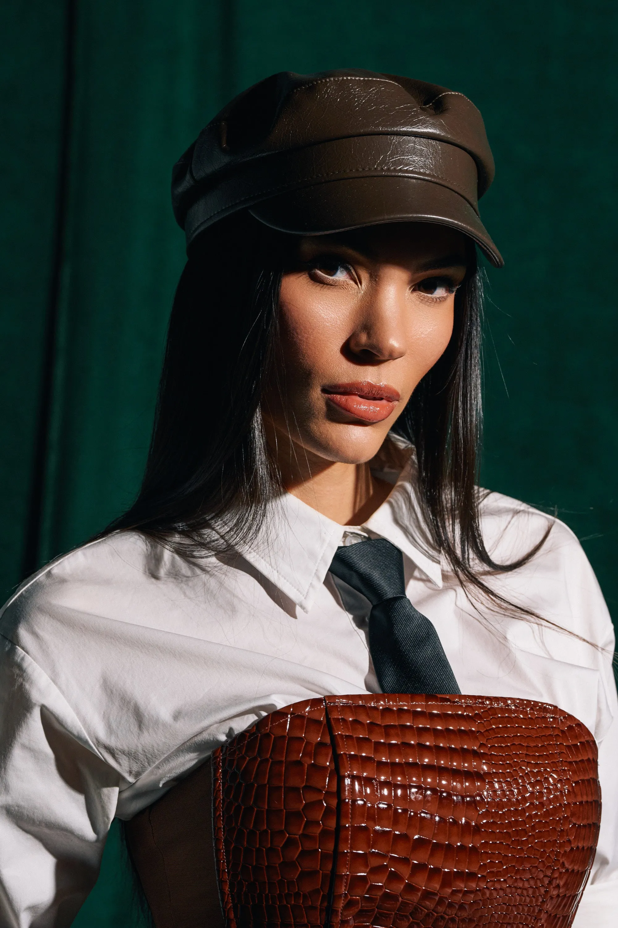 LIKE BUTTER PU BRIM HAT sold by AKIRA