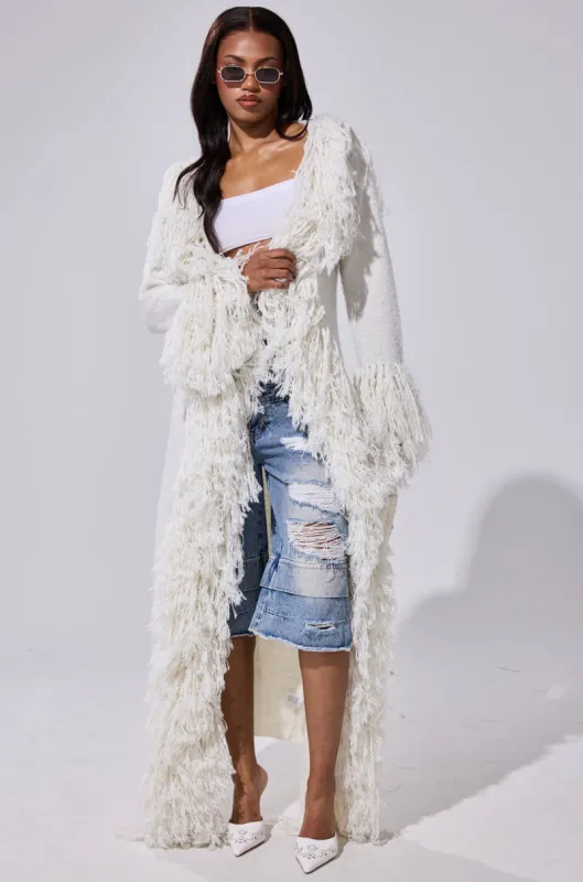 BURRR IT'S COLD OUTSIDE FRINGE OVERSIZED SWEATER IN IVORY sold by AKIRA