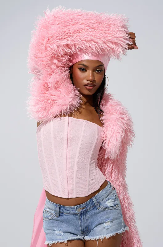 LEILA ULTRA CROP FAUX FUR IN LIGHT PINK sold by AKIRA