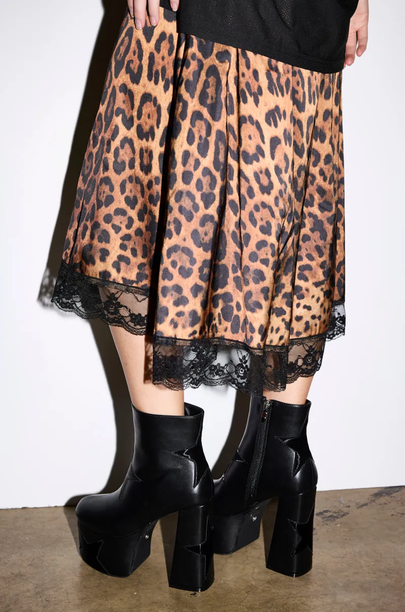 AZALEA WANG LUKYIE BLACK STAR DETAIL PLATFORM BOOTIE sold by AKIRA