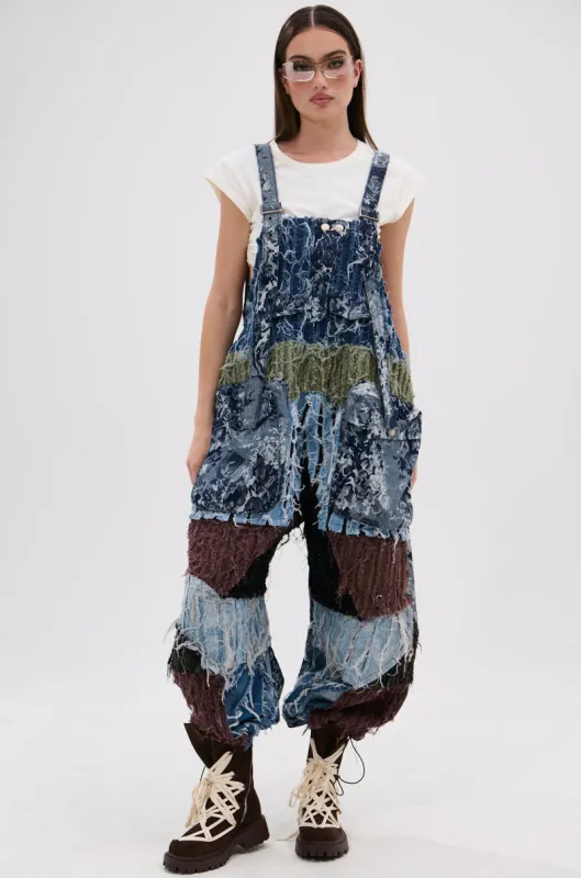 JUST LIKE THAT BAGGY FIT OVERALLS IN PATCHWORK DENIM sold by AKIRA