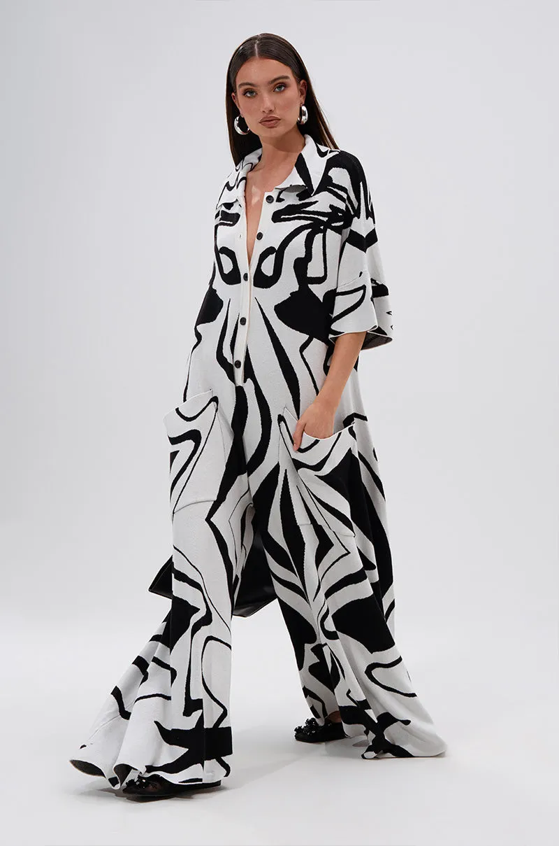 HAPPY HOUR PRINTED KNIT JUMPSUIT sold by AKIRA