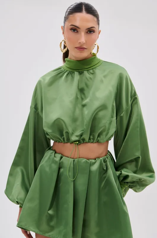 POP IT OFF TURTLENECK BLOUSE sold by AKIRA