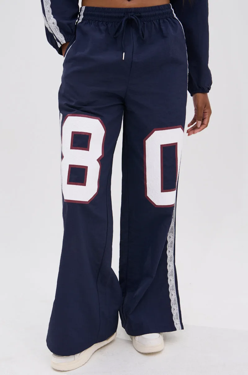 LACE TRIM NYLON TRACK PANT sold by AKIRA product image thumbnail 3