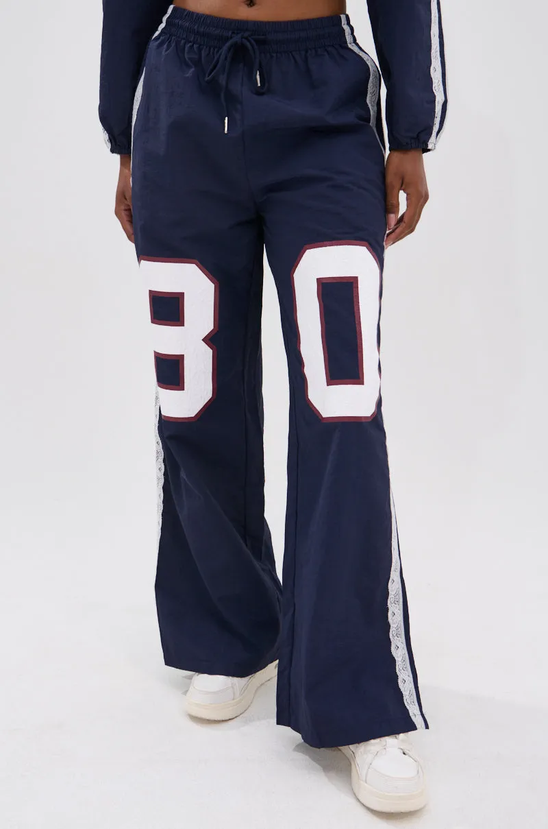 LACE TRIM NYLON TRACK PANT sold by AKIRA product image thumbnail 2