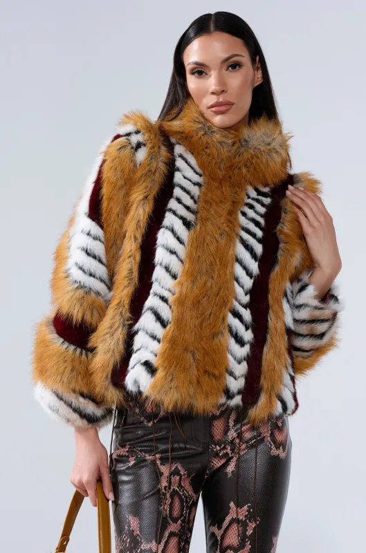 OLYMPIA PANELED FAUX FUR sold by AKIRA