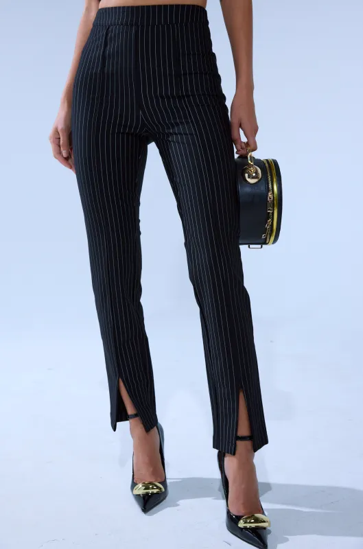 LIVI STRETCHY PINSTRIPE SKINNY PANTS WITH SLITS sold by AKIRA