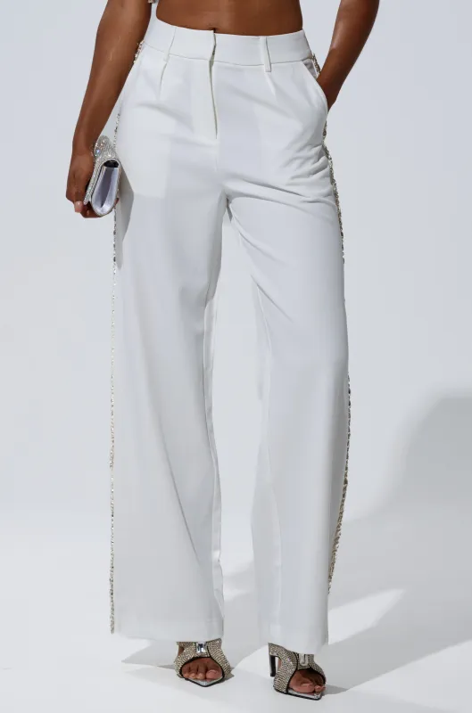 TALK TO ME TROUSER WITH RHINESTONE IN WHITE sold by AKIRA
