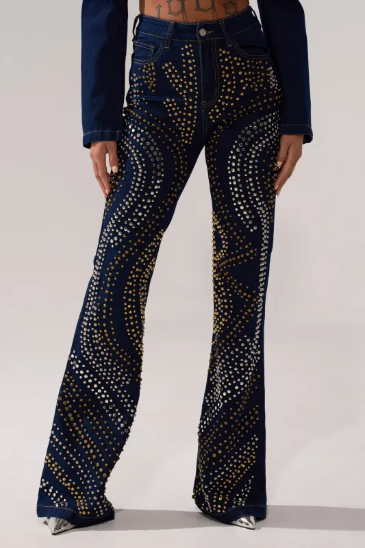 CHEYENNE STUDDED FLARE DENIM sold by AKIRA