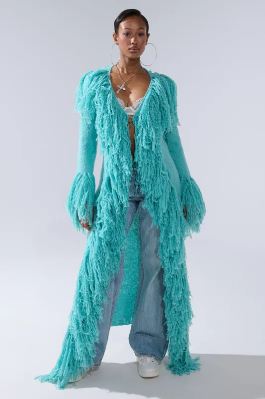 BURRR IT'S COLD OUTSIDE FRINGE OVERSIZED SWEATER IN TURQUOISE sold by AKIRA