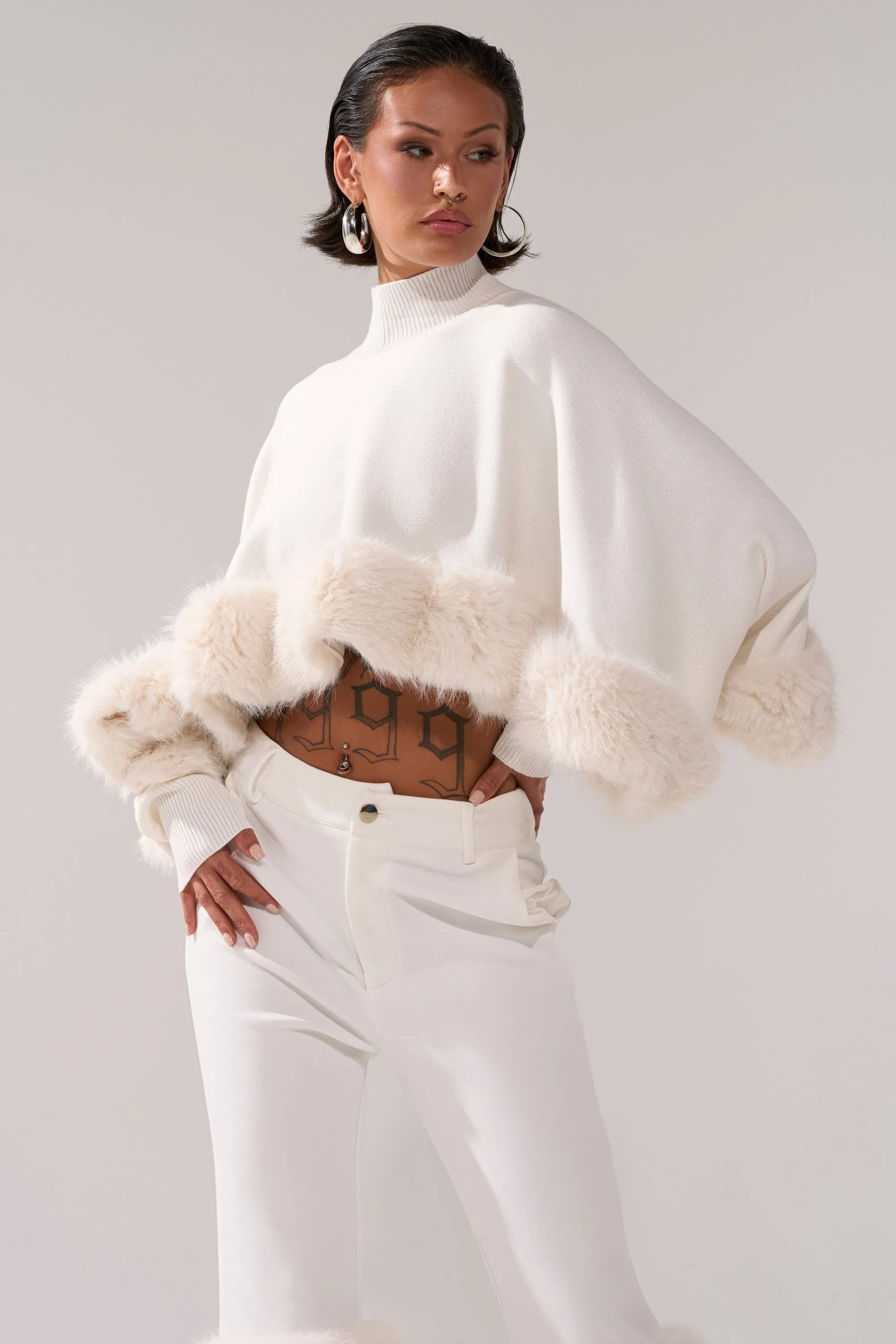 QUIET LUX FUR TRIM SWEATER IN WHITE sold by AKIRA