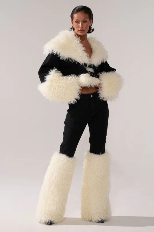 SITTING PRETTY FUR TRIM DENIM made by AKIRA