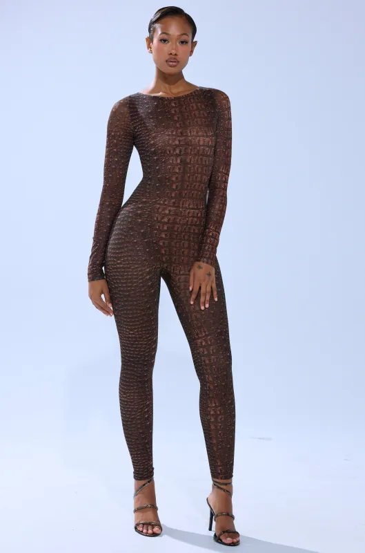 TRY AND GET ME SNAKE MESH JUMPSUIT sold by AKIRA