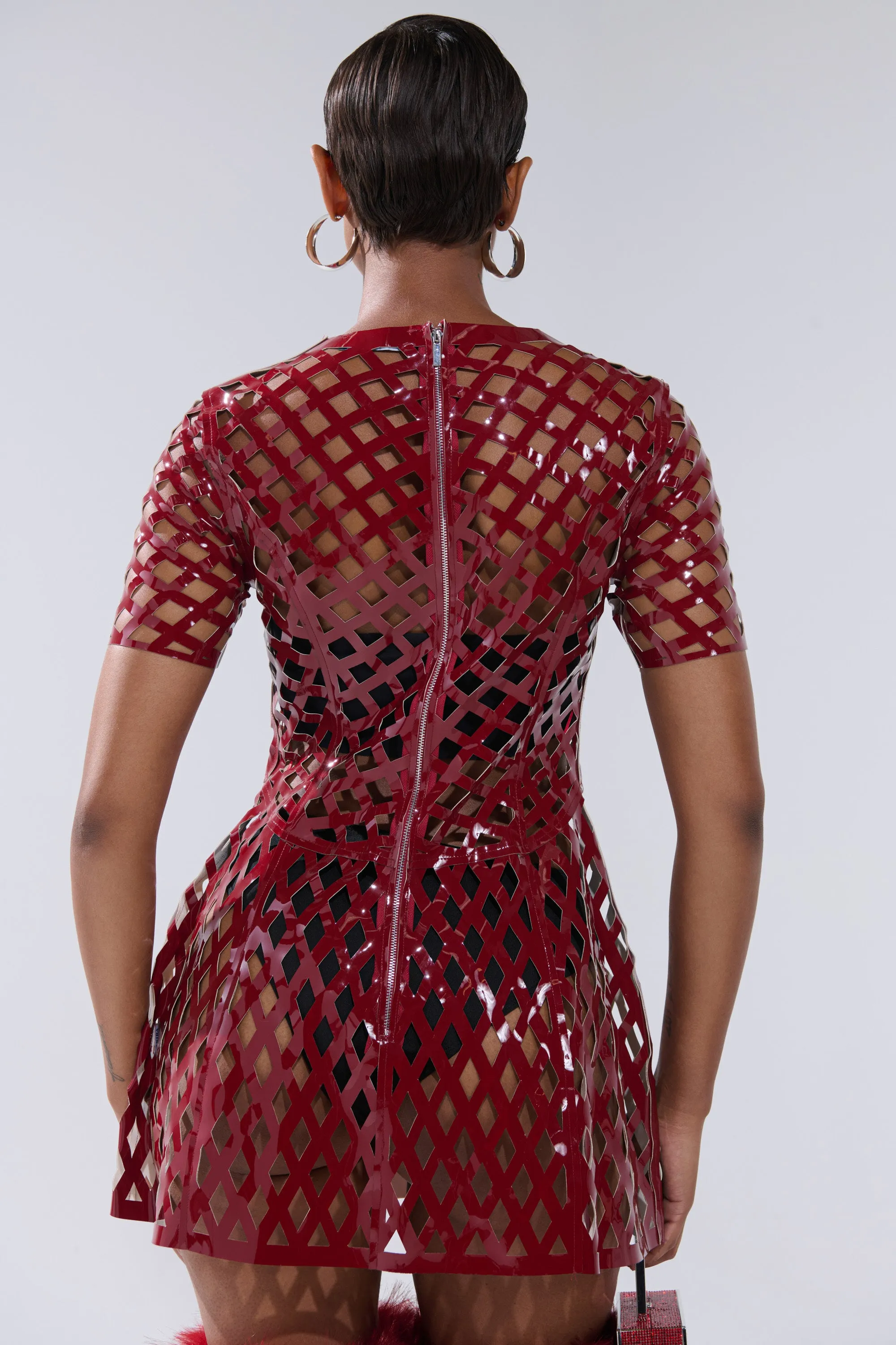 SHE'S DIFFERENT CUT OUT FAUX LEATHER MINI DRESS IN BURGUNDY sold by AKIRA product image thumbnail 4