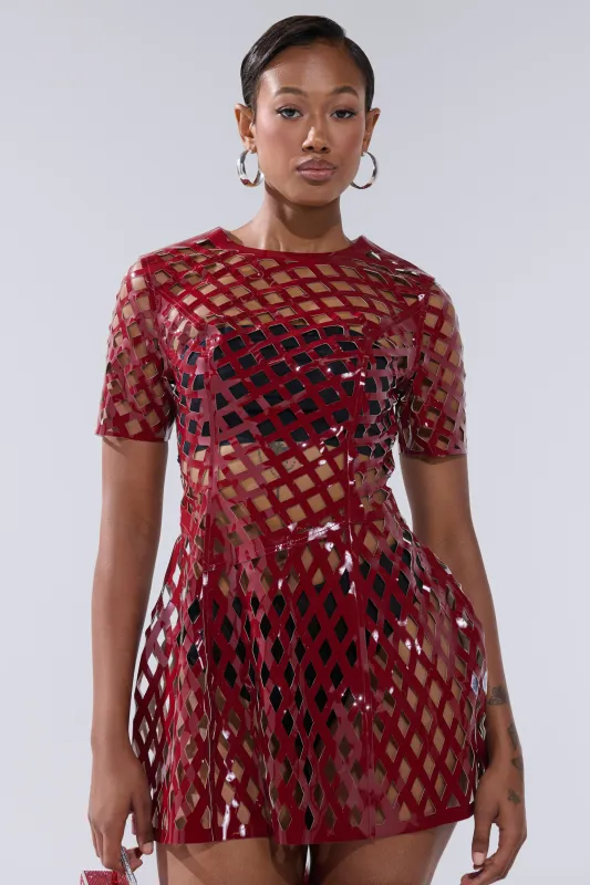 SHE'S DIFFERENT CUT OUT FAUX LEATHER MINI DRESS IN BURGUNDY sold by AKIRA