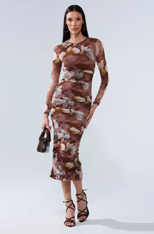 FELT CUTE PRINTED MIDI DRESS sold by AKIRA