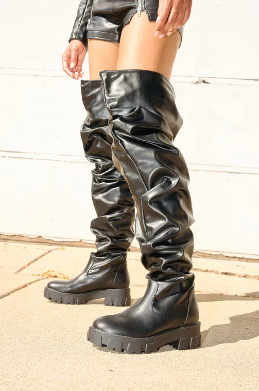 AZALEA WANG KIPLING BLACK RUCHED UP FLAT BOOT sold by AKIRA