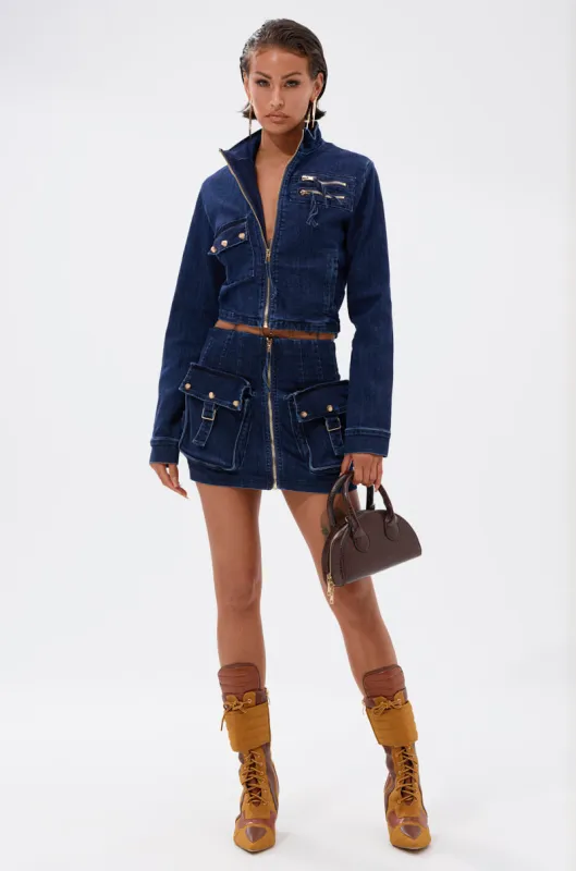 SOMETHING BETTER DENIM MINI SKIRT sold by AKIRA