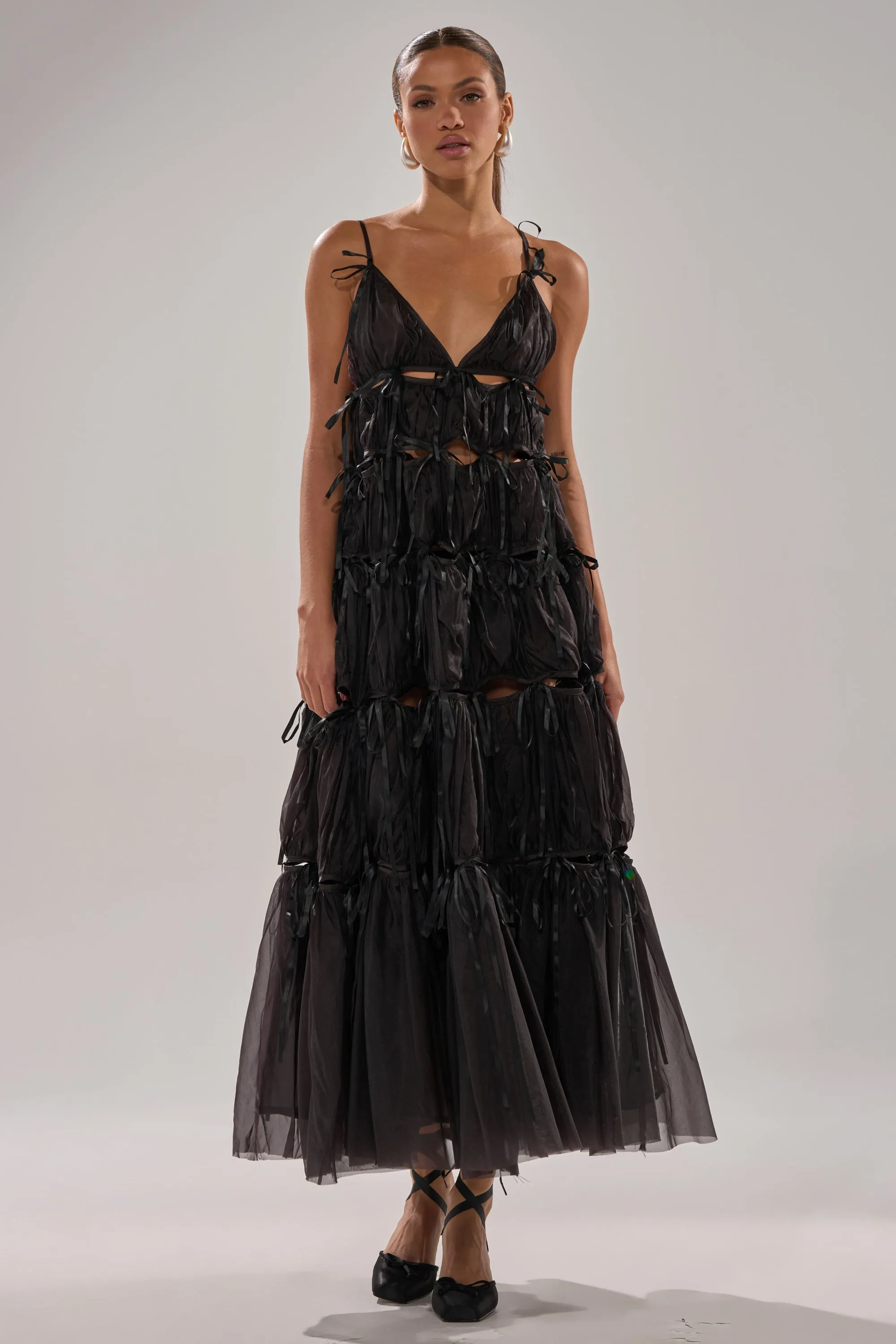 COULDN'T BE ME IF YOU TRIED TIE MAXI DRESS IN BLACK sold by AKIRA