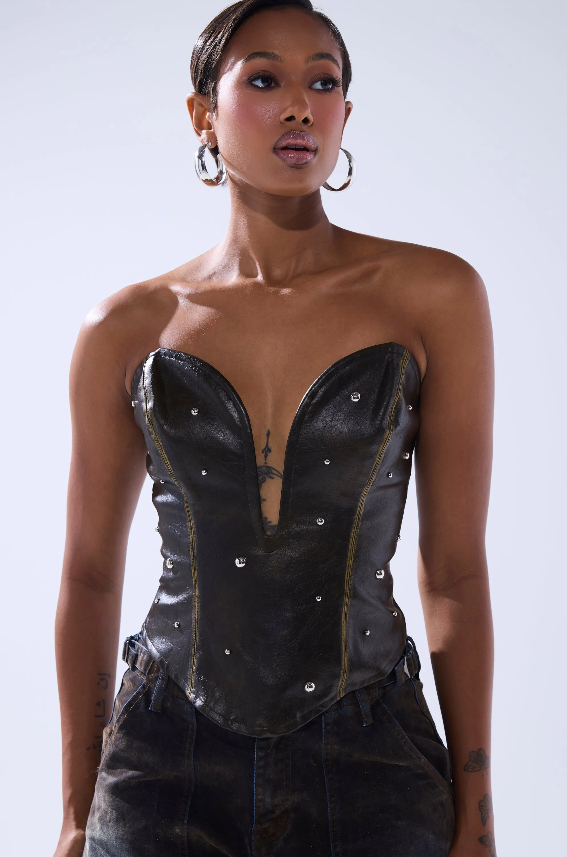 HARD TO PLEASE STUDDED FAUX LEATHER CORSET sold by AKIRA product image thumbnail 2