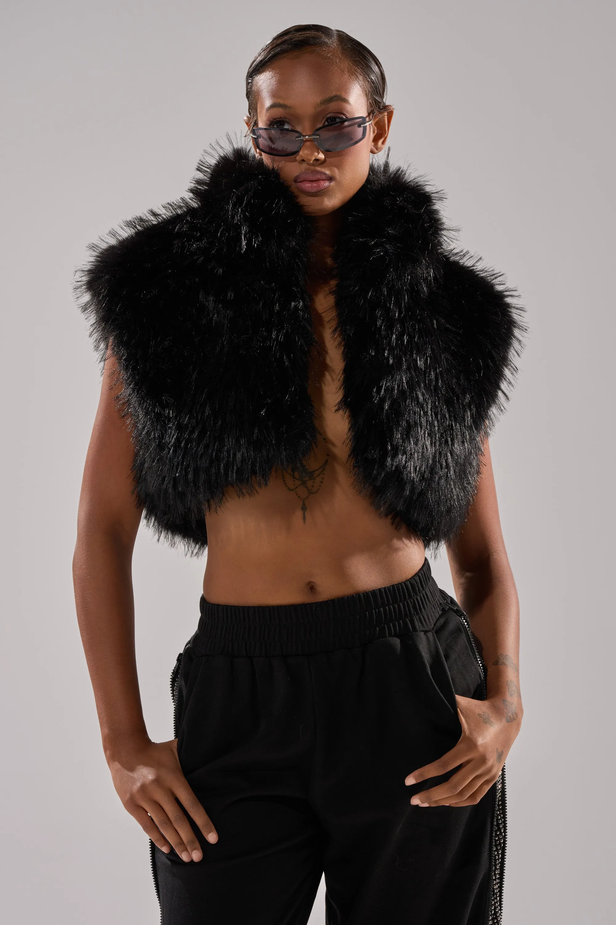 COCO CROPPED FUR VEST IN BLACK sold by AKIRA