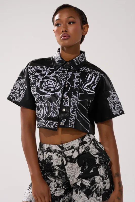 MAKE IT OFFICIAL FAUX LEATHER BUTTON DOWN IN BLACK sold by AKIRA