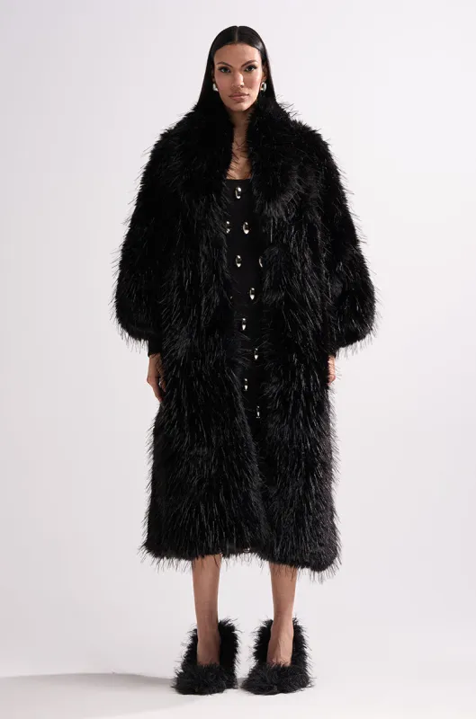 TSUNAMI FAUX FUR COAT IN BLACK sold by AKIRA